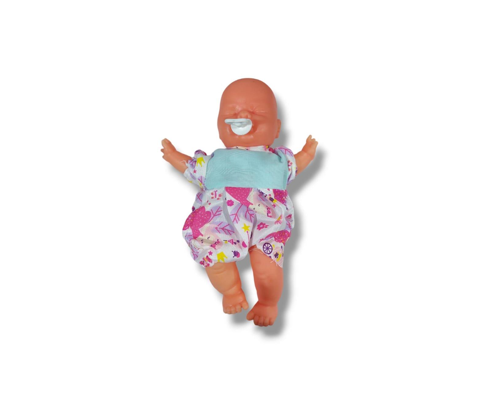 BEBE CON CHUPETE Y ROPITA 25CM